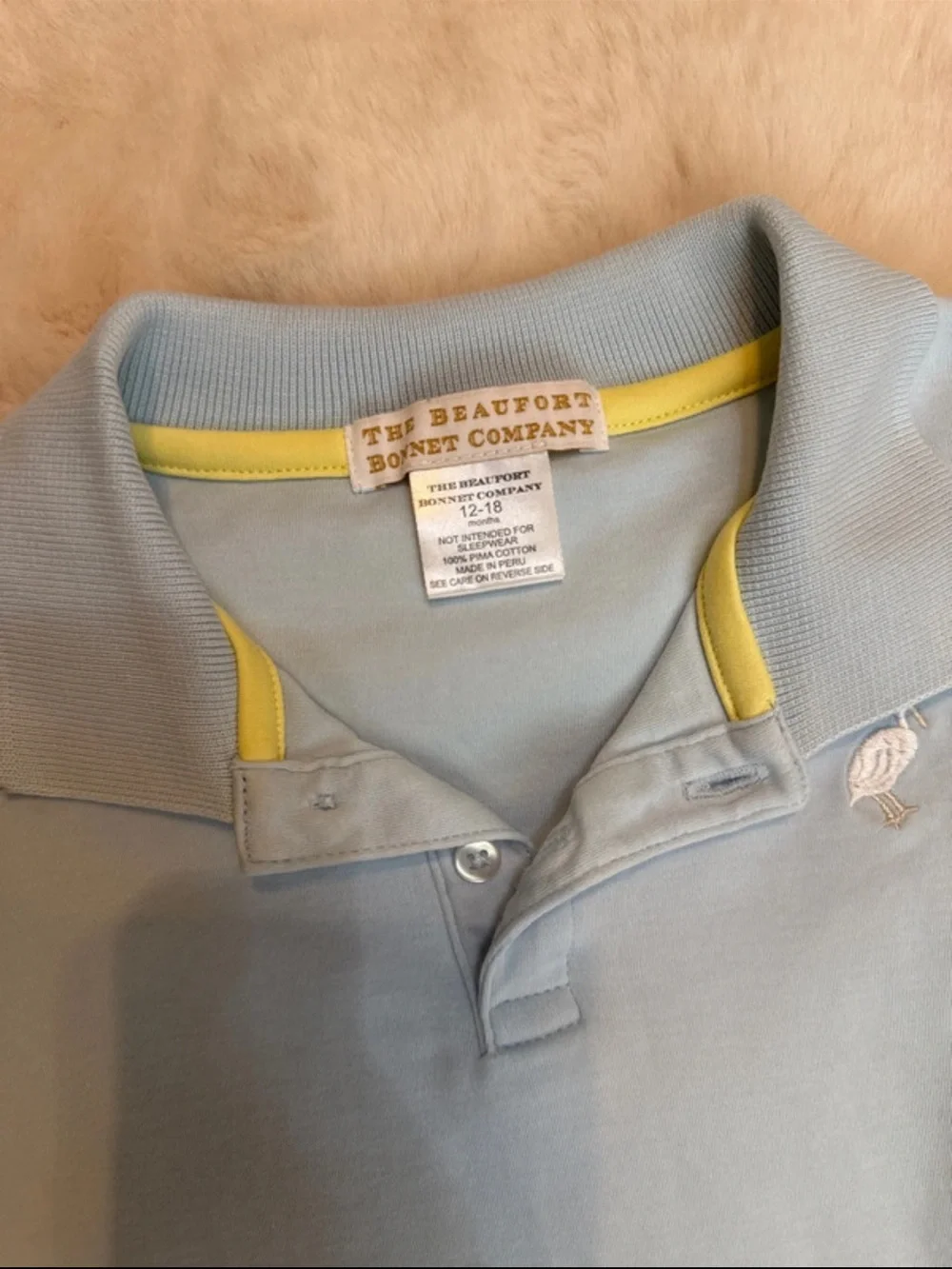 The Beaufort Bonnet Company Light Blue Polo Romper with Yellow Trim